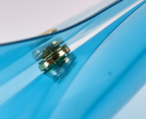glasses-case-clear-series-button-close-up.