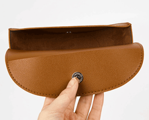 brown soft leather eyeglass case button