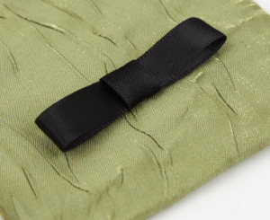 squeeze top eyeglass pouch ribbon detail