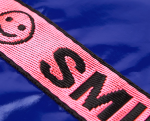 glossy polyester sunglasses pouch fabric logo closeup